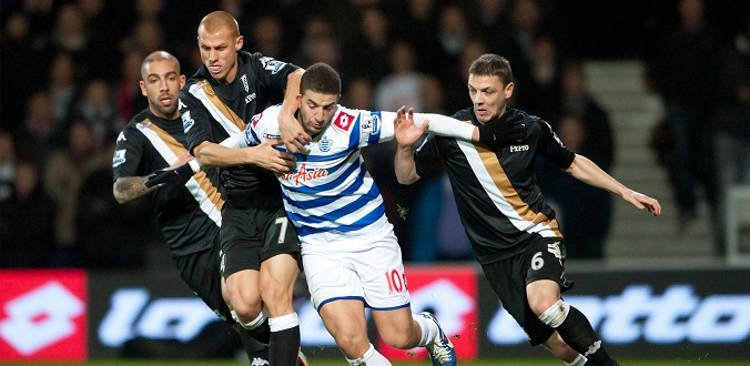 Editorial use only. No merchandising. Football Association and Premier League restrictions apply inc. no internet/mobile usage without FAPL license. It is the picture user's responsibility to adhere to all restrictions - for details contact Football Dataco Mandatory Credit: Photo by Back Page Images/REX/Shutterstock (2049934d) Adel Taarabt of QPR takes on Chris Baird and Steve Sidwell and Mahamadou Diarra of Fulham Queens Park Rangers v Fulham, FA Premier League football match, Loftus Road, London, Britain - 15 Dec 2012
