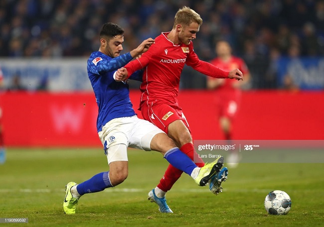 GELSENKIRCHEN, GERMANY - NOVEMBER 29: Sebastian Andersson of 1. FC Union Berlin is tackled by Ozan Kabak of FC Schalke 04 during the Bundesliga match between FC Schalke 04 and 1. FC Union Berlin at Veltins-Arena on November 29, 2019 in Gelsenkirchen, Germany. (Photo by Lars Baron/Bongarts/Getty Images)